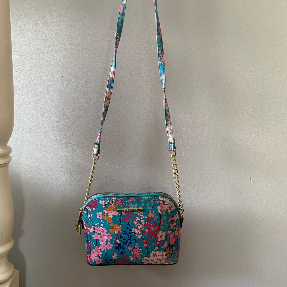 Steve Madden. Blue with flowers and gold accents